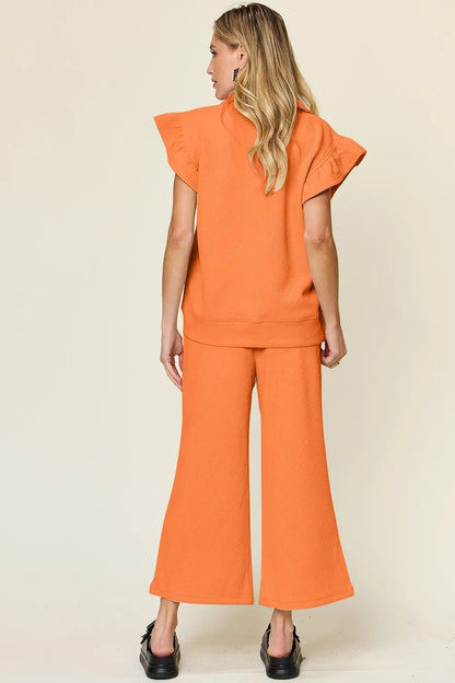Double Take Texture Ruffle Short Sleeve Top and Drawstring Wide Leg Pants Set - NORIVE