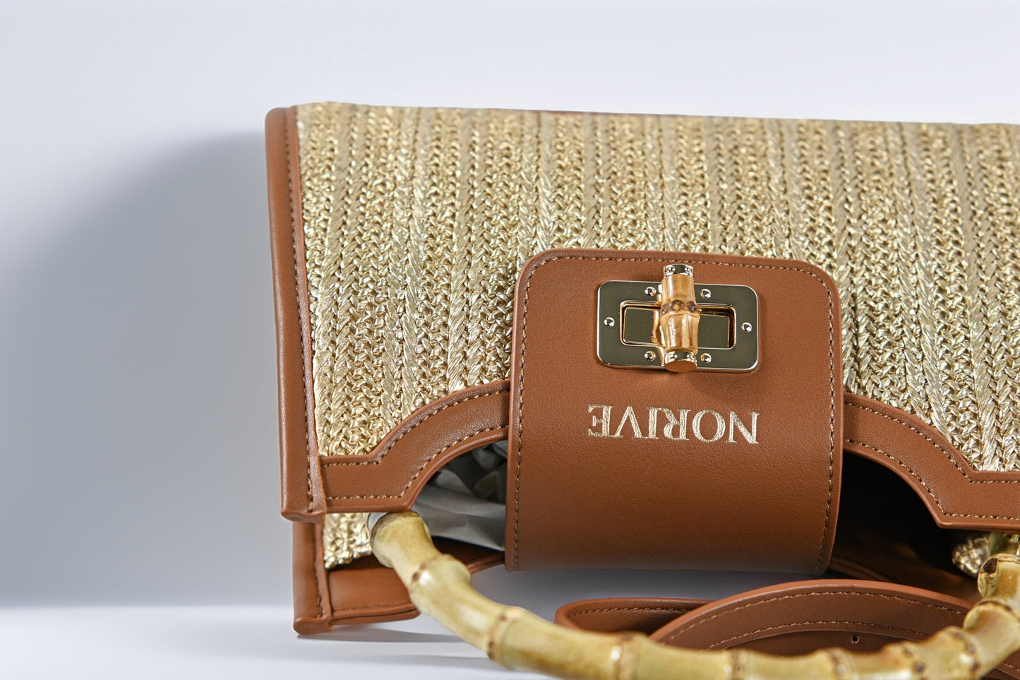 Front flap detail of NORIVE Isla Bamboo Satchel with Bamboo accent