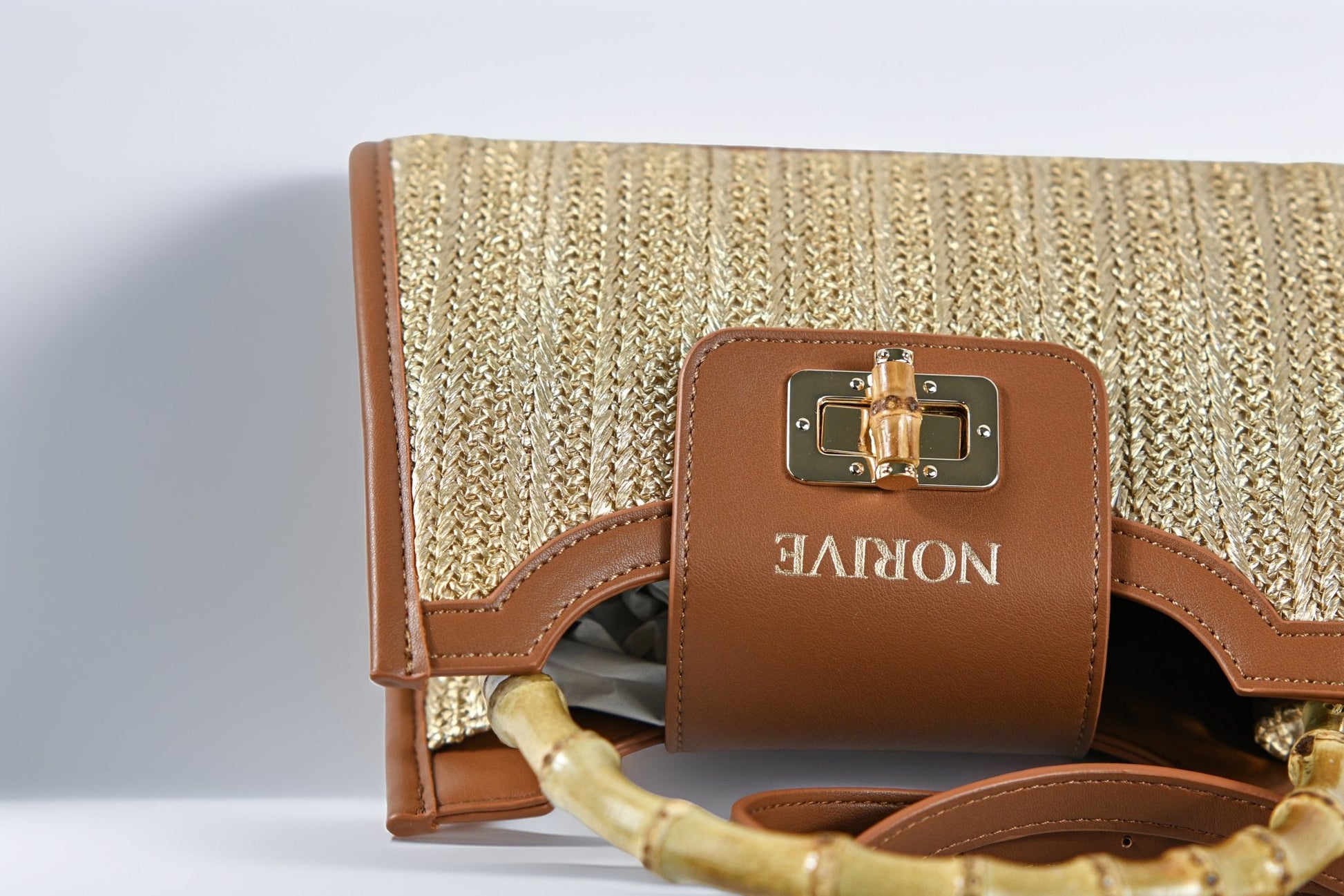Front flap detail of NORIVE Isla Bamboo Satchel with Bamboo accent